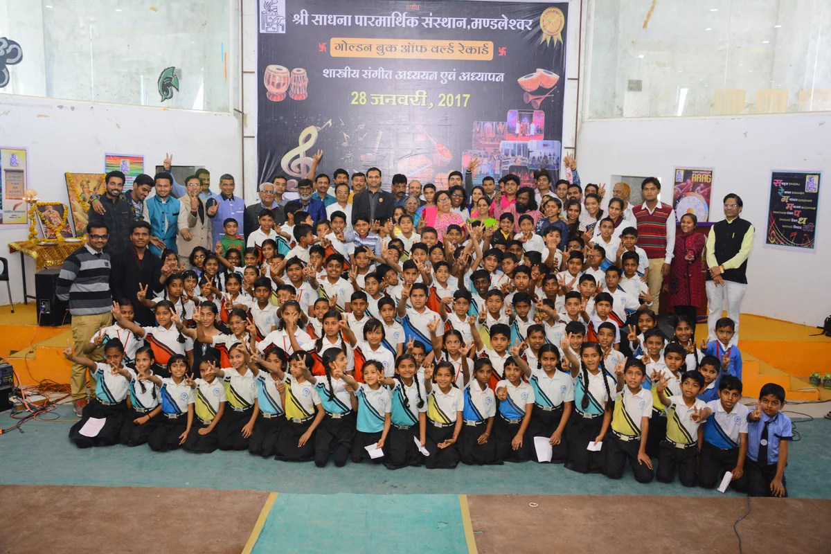 Students and teachers at a Sur Chaitanya school music program